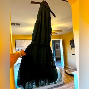 Dark green semi-formal dress with high neckline and tie at the waist